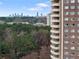 A view from the building that has the skyline set back among the trees at 1501 Clairmont Rd # 1027, Decatur, GA 30033