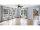 Bright sunroom with tile flooring and large windows overlooking the backyard at 3911 Ivy Ne Rd, Atlanta, GA 30342