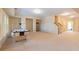 Spacious finished basement featuring neutral carpet and an air hockey table at 3955 Graystone Preserve Pl, Cumming, GA 30040