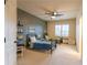Spacious ' bedroom with two beds, floating shelves, and plenty of room to play at 3955 Graystone Preserve Pl, Cumming, GA 30040