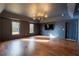 Bonus room features stylish lighting, hardwood floors and provides flexible living space at 3955 Graystone Preserve Pl, Cumming, GA 30040