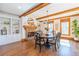 Charming dining room features a stone fireplace, built-in shelves, and natural light at 3955 Graystone Preserve Pl, Cumming, GA 30040