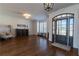 Bright and airy entryway with detailed trim and hardwood flooring at 3955 Graystone Preserve Pl, Cumming, GA 30040