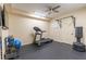 Finished basement exercise room complete with treadmill and workout equipment at 3955 Graystone Preserve Pl, Cumming, GA 30040