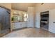 Expansive primary bathroom featuring a walk-in shower, vanity, and access to the bedroom at 3955 Graystone Preserve Pl, Cumming, GA 30040