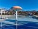 Community pool featuring mushroom water feature, water slides, and plenty of seating at 3955 Graystone Preserve Pl, Cumming, GA 30040