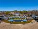 Aerial view of the community pool and surrounding amenities, including a playground at 3955 Graystone Preserve Pl, Cumming, GA 30040