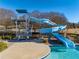 Waterslide at the community pool offering fun and recreation for residents of all ages at 3955 Graystone Preserve Pl, Cumming, GA 30040