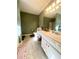 Bathroom with vanity and a large mirror, ideal for daily routines and grooming at 884 Poole Bridge Rd, Hiram, GA 30141