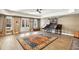 Spacious basement with luxury vinyl plank flooring and a walkout to the backyard at 12867 Etris Walk, Roswell, GA 30075