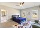 Cozy bedroom with natural light, comfortable bed, and stylish rug at 12867 Etris Walk, Roswell, GA 30075