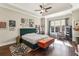 Stylish bedroom with tray ceilings, hardwood floors, and lots of natural light at 12867 Etris Walk, Roswell, GA 30075