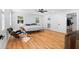 A spacious bedroom features hardwood floors, a ceiling fan, and ample natural light at 1819 Avon Ave, Atlanta, GA 30311