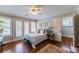 Bright bedroom with hardwood floors, shutters and access to a balcony at 592 Moreland Ne Ave, Atlanta, GA 30307