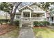 Charming home featuring a welcoming front porch, well-manicured landscaping, and inviting curb appeal at 592 Moreland Ne Ave, Atlanta, GA 30307