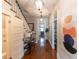 Inviting hallway with elegant lighting, hardwood floors, and tasteful decor at 592 Moreland Ne Ave, Atlanta, GA 30307