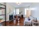 Cozy living room with fireplace, hardwood floors, and plenty of natural light at 592 Moreland Ne Ave, Atlanta, GA 30307