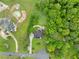 Aerial view of house with a circular driveway, and landscaped yard at 789 Rutland Ct, Lithonia, GA 30058
