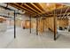 Unfinished basement with exposed beams and concrete floor at 789 Rutland Ct, Lithonia, GA 30058
