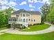 Charming two-story home featuring a screened porch and a basketball court area at 789 Rutland Ct, Lithonia, GA 30058