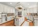 Bright kitchen with granite countertops, stainless steel appliances, and a large center island at 789 Rutland Ct, Lithonia, GA 30058