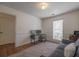 This home office features a desk area, gray couch, and neutral carpet at 2260 Golden Valley Dr, Lawrenceville, GA 30043