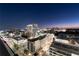 This aerial view of the city shows buildings at night at 3325 Piedmont Ne Rd # 1504, Atlanta, GA 30305