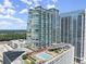 Stunning full building view of a high rise apartment building, complete with rooftop pool and common areas at 3325 Piedmont Ne Rd # 1504, Atlanta, GA 30305