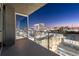 This balcony features a city view and glass railings at 3325 Piedmont Ne Rd # 1504, Atlanta, GA 30305