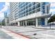 Modern high rise with glass exterior, prominent signage, and attractive streetscape at 3325 Piedmont Ne Rd # 1504, Atlanta, GA 30305
