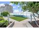 A pet-friendly community offers green space in a fenced dog park with landscaping and secure access at 3325 Piedmont Ne Rd # 1504, Atlanta, GA 30305