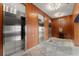 Three modern stainless steel elevators serving wood-paneled lobby on stone flooring with soft overhead lights at 3325 Piedmont Ne Rd # 1504, Atlanta, GA 30305
