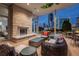 Inviting outdoor fireplace on a patio, offering comfortable seating and an ambiance for relaxing evenings at 3325 Piedmont Ne Rd # 1504, Atlanta, GA 30305