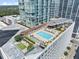Rooftop amenities include pool, turf area, and plenty of lounge chairs overlooking the city at 3325 Piedmont Ne Rd # 1504, Atlanta, GA 30305