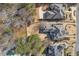 An aerial view of the property showing the home, driveway, landscaping, and surrounding trees at 426 Lanesborough Dr, Marietta, GA 30064