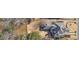 The home and neighboring vacant lot as seen from above, surrounded by trees and landscaping at 426 Lanesborough Dr, Marietta, GA 30064