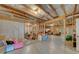 Unfinished basement with exposed beams and framing, offering potential for customization and expansion at 426 Lanesborough Dr, Marietta, GA 30064
