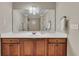 Bathroom featuring a wood vanity with a white countertop, a large mirror, and recessed lighting at 426 Lanesborough Dr, Marietta, GA 30064