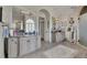 Bathroom features dual vanities, granite countertops, framed mirrors, soaking tub and walk-in shower at 426 Lanesborough Dr, Marietta, GA 30064