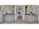 Luxurious bathroom with dual vanities, granite countertops, and decorative mirrors at 426 Lanesborough Dr, Marietta, GA 30064
