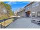 Expansive deck area featuring wood railing and spiral staircase with views of the surrounding yard at 426 Lanesborough Dr, Marietta, GA 30064