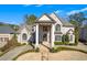 Beautiful brick home featuring a grand entrance with stately columns and lush landscaping at 426 Lanesborough Dr, Marietta, GA 30064