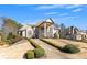 Elegant home featuring a circular driveway, manicured hedges, and a classic architectural design at 426 Lanesborough Dr, Marietta, GA 30064