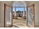 View through decorative glass front doors out to the front of the house at 426 Lanesborough Dr, Marietta, GA 30064