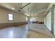 Spacious three car garage featuring a clean concrete floor at 426 Lanesborough Dr, Marietta, GA 30064