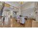 Bright living room featuring high ceilings, fireplace, hardwood floors, and elegant furnishings at 426 Lanesborough Dr, Marietta, GA 30064