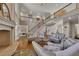 Spacious living room with fireplace, staircase, and hardwood floors at 426 Lanesborough Dr, Marietta, GA 30064