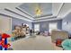 Play room with an unique ceiling, lots of toys and lots of natural light at 426 Lanesborough Dr, Marietta, GA 30064