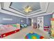 Play room with an unique ceiling, lots of toys and fun decor at 426 Lanesborough Dr, Marietta, GA 30064