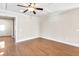 Hardwood floors and coffered ceilings enhance this flexible living space at 1100 N North Village Drive Dr, Decatur, GA 30032